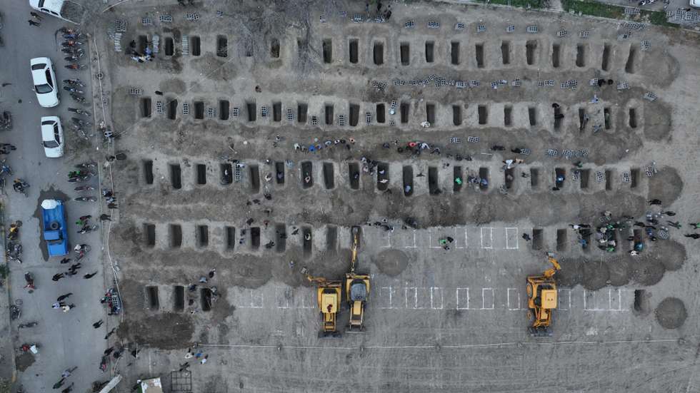 epa12791539 A handout picture made available by the Iranian foreign press department shows graves being prepared for the victims of a Israel-US airstrike on a girls school in the city of Minab, southern Iran, 03 March 2026. At least 165 girl students and teachers were killed on 28 February 2026,  in a Israel-US airstrike on the school, with the Israeli military claiming it was not aware of any attacks in the area.  EPA/HANDOUT HANDOUT EDITORIAL USE ONLY/NO SALES