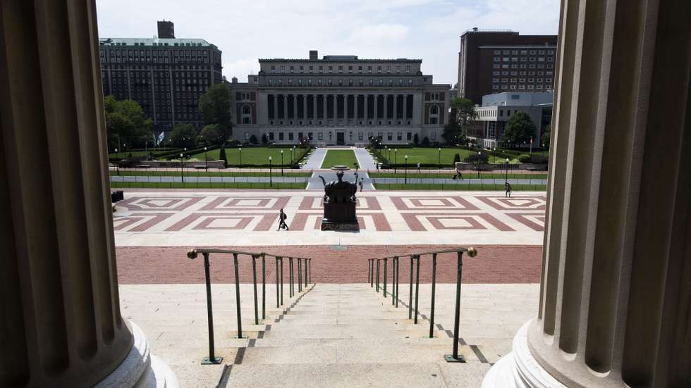 epa08563081 People walk through the campus of Columbia University in New York, New York, USA, 23 July 2020. Schools and colleges around the country are trying to navigate how students can return to in-person classes in the fall, as the coronavirus pandemic continues to spread in the United States.  EPA/JUSTIN LANE
