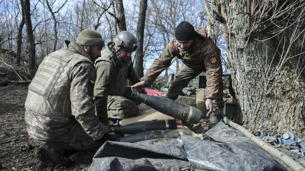 epa10500959 Ukrainian soldiers prepare munitions at their position in the Zaporizhzhia area, Ukraine, 02 March 2023 (issued 03 March 2023) Russian troops entered Ukrainian territory on 24 February 2022, starting a conflict that has provoked destruction and a humanitarian crisis.  EPA/STR
