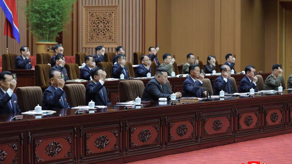 epa10887070 A photo released by the official North Korean Central News Agency (KCNA) on 28 September 2023 shows North Korean leader Kim Jong Un (C, front row) attending the 9th Session of the 14th Supreme People's Assembly (SPA) at the Mansudae Assembly Hall in Pyongyang, North Korea, during the two-day event on 26-27 September 2023. North Korea's legislature has enshrined its status as a nuclear power in its constitution with the unanimous adoption of a 'crucial agenda item for formulating the DPRK's policy on nuclear force as the basic law of the state', according to KCNA.  EPA/KCNA   EDITORIAL USE ONLY