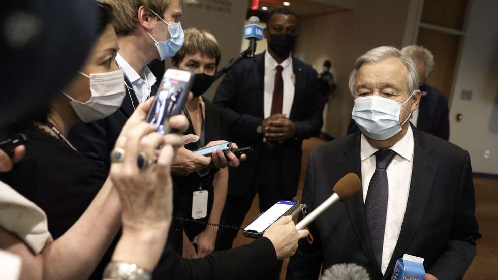epa09416778 United Nations Secretary-General Antonio Guterres (C) speaks to media after the United Nations Security Council met regarding the situation in Afghanistan, outside the Security Council stakeout area at United Nations Headquarters in New York, New York, USA, 16 August 2021.  EPA/PETER FOLEY