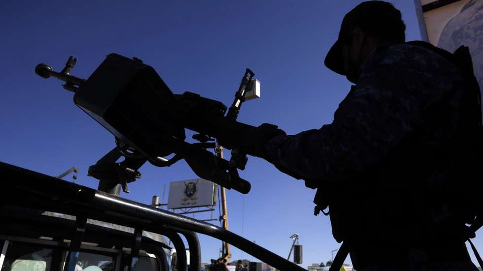 epa11831562 A Houthi soldier mans a machine gun on a vehicle while on patrol during a pro-Palestinian rally following the Israel-Hamas ceasefire deal, in Sana'a, Yemen, 17 January 2025. Thousands of Houthi supporters gathered in Sana'a to show their support to the Palestinian people following a Gaza ceasefire deal reached by Israel and Hamas. Houthi leader Abdul-Malik al-Houthi, in a televised speech on 16 January, said that Yemen's Houthis will monitor the implementation of the ceasefire deal aimed at ending the war in Gaza, and threatened to keep up their attacks in support of the Palestinians in case Israel backtracks from it.  EPA/YAHYA ARHAB