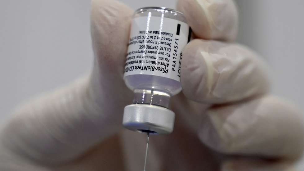 epa09033426 A health worker prepares to inject a dose of the Pfizer-BioNTech COVID-19 vaccine during a nationwide vaccination campaign, at the Saint George Hospital University Medical Center (Al-Roum hospital) at Ashrafieh area in Beirut, Lebanon, 24 February 2021. The World Bank warned that it may halt funding for Lebanonâ€™s COVID-19 vaccination campaign after 16 lawmakers and five of their staff members were vaccinated inside the Lebanese parliament building on 23 February, violating regulations which aim to keep the process fair and transparent.  EPA/WAEL HAMZEH
