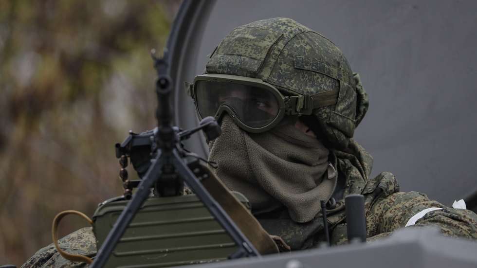 epa09888260 A picture taken during a visit to Shchastia organized by the Russian military shows a Russian serviceman guards on the entrance of the Luhansk Power Station in Luhansk region, in Shchastia, Luhansk region, Ukraine, 13 April 2022. Stopped by the Ukrainian side a few days before the start of the Russian special operation, the station provided electricity to more than a million people. The Ukrainian Armed Forces mined the object during the retreat, and some high-voltage power lines were damaged during the fighting. The station is a strategic and important energy facility of the self-proclaimed Luhansk People's Republic. After the start of operation of the station, it will be possible to start production at the metallurgical enterprises of the republic, which was stopped in 2014, when the station was cut off from the energy system of Lugansk. On 24 February Russian troops had entered Ukrainian territory in what the Russian president declared a 'special military operation', resulting in fighting and destruction in the country, a huge flow of refugees, and multiple sanctions against Russia.  EPA/SERGEI ILNITSKY