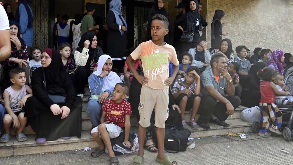 epa10848763 Palestinian residents who fled their homes after clashes between supporters of the Fatah movement and rival groups in Ain el-Hilweh Palestinian refugee camp rest at a local mosque in Sidon, Lebanon, 08 September 2023. The clashes erupted again on 07 September at Ain al-Hilweh Palestinian refugee camp nearly a month after a ceasefire ended days of violence. A large number of residents of the camp were displaced from their homes due to the renewed fighting.  EPA/WAEL HAMZEH