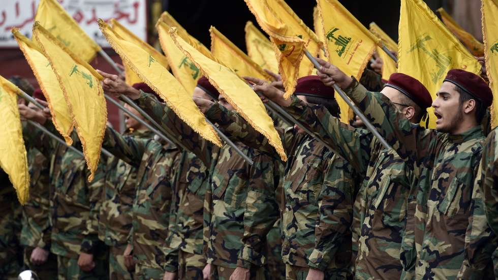 epa11331757 Hezbollah militants take the oath during the funeral of late Hezbollah fighter Hussein Ahmed Hamdan in Beirut, Lebanon, 10 May 2024. According to the Lebanese military, three Hezbollah fighters and a civilian were killed on 09 May in an Israeli airstrike in Lebanon's southern village of Bafliyeh in the district of Tyre.  EPA/WAEL HAMZEH