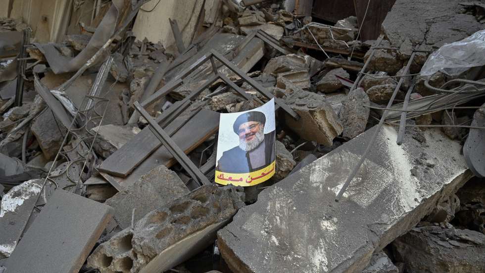 epaselect epa11641195 A picture of slain Hezbollah leader Hassan Nasrallah sits of over the rubble of a damaged building following an Israeli airstrike in Al Mreijeh, in the southern suburbs of Beirut, Lebanon, 04 October 2024. According to Lebanon's National News Agency (NNA), Israeli raids targeted Beirut's southern suburbs overnight, hitting areas near Mreijeh, Hadi Nasrallah Highway and Hadath, and resulting in the collapse of several buildings and facilities. Lebanese Minister of Health, Firas Abiad, announced on 03 October, that 1,974 people have been killed, including 127 children and 261 women, and 9,384 others have been injured in Lebanon since the beginning of the Hezbollah-Israeli conflict.  EPA/WAEL HAMZEH
