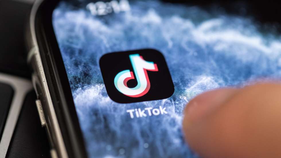epa08678605 (FILE) - A close-up shows the video-sharing application 'TikTok' on a smart phone in Berlin, Germany, 07 July 2020 (reissued 18 September 2020). The US Commerce Department on 18 September 2020 announced that downloads of ByteDance's video sharing app TikTok and multi-purpose messaging and payment platform WeChat will be blocked in the US starting 20 September 2020.  EPA/HAYOUNG JEON