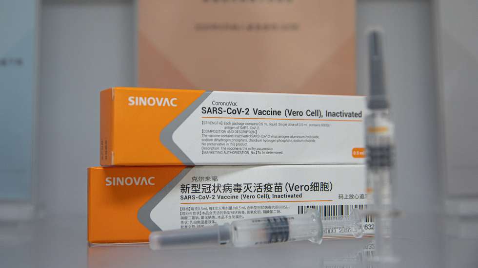 epa08628343 Sinovac's COVID-19 vaccine candidate CoronaVac is displayed at the company's headquarters in Beijing, China, 26 August 2020 (issued 27 August 2020). Chinese company Sinovac Biotech is developing the COVID-19 vaccine candidate called CoronaVac.  EPA/ROMAN PILIPEY