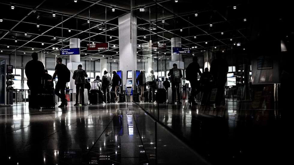 epa08485980 Passengers queue at a check-in counter of the international airport in Duesseldorf, Germany, early 15 March 2020. Since the travel restrictions in Germany began, the first aircraft of German airline TUI fly to the Spanish Mediterranean island of Mallorca will depart from Duesseldorf. Up to 10,900 vacationers from Germany will be able to travel to the Balearic Islands to Mallorca, Ibiza, Menorca and Formentera bit by bit from 15 June onwards.  EPA/SASCHA STEINBACH