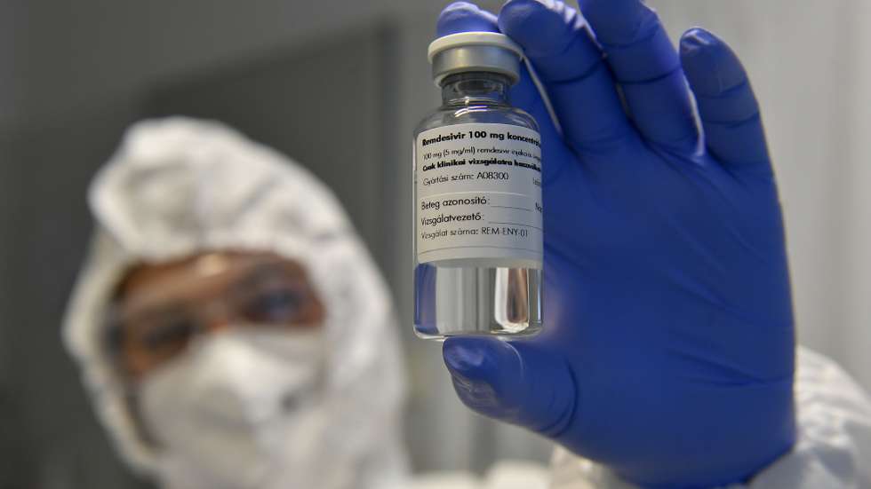 epa08748647 A medicine containing the agent remdesivir is shown by a health worker at the Institute of Infectology of Kenezy Gyula Teaching Hospital of the University of Debrecen in Debrecen, Hungary, 15 October 2020. The drug developed by the Budapest, Hungary, based Chemical Works of Gedeon Richter Plc., a pharmaceutical company, is administered to novel coronavirus patients in serious condition as a clinical test to stop the replication of the virus.  EPA/Zsolt Czegledi HUNGARY OUT