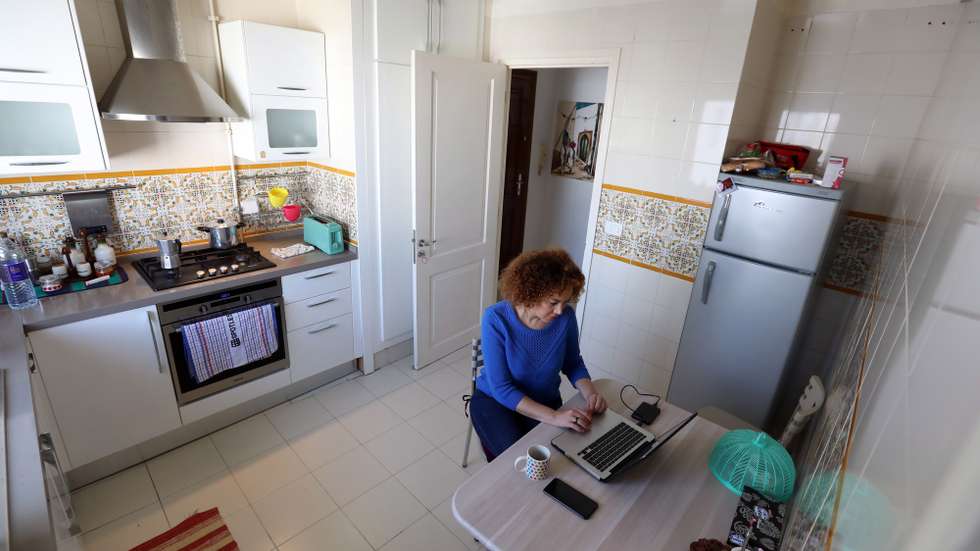 epa08332095 Wissal Ayadi, 34, journalist works from her home in Tunis, Tunisia, 30 March 2020.  Most companies, are opting for teleworking to limit the spread of the covid-19 coronavirus.  She works for a news website which opted for teleworking, to limit the spread of Covid-19. Wissal says that 'it is very hard to work from your place when you are a journalist because it is better to be on the field to cover news'. She also says that thanks to the internet she is able to do interviews by video-calls.  EPA/MOHAMED MESSARA  ATTENTION: This Image is part of a PHOTO SET