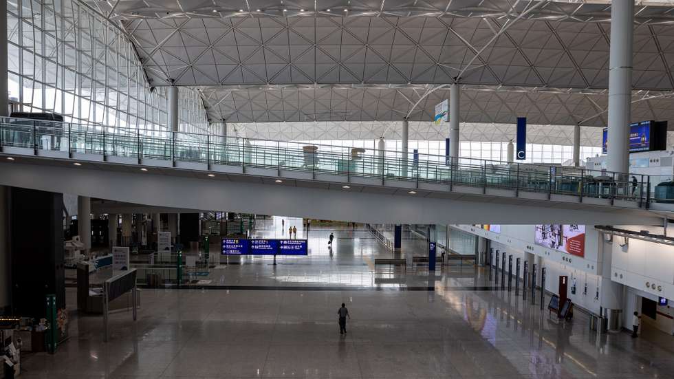 epa08756705 A man walks in the arrival hall of Hong Kong International Airport in Hong Kong, China, 19 October 2020. According to traffic figures released by the Airport Authority for September 2020, the airport handled 100,000 passengers and 10,535 flight movements, representing year-on-year decreases of 97.9 percent and 68.5 percent, respectively.  EPA/JEROME FAVRE