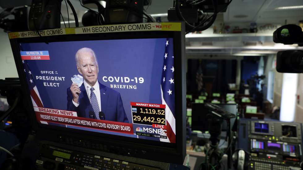 epa08810141 US President-elect Joe Biden is seen during his statement on television monitors in the briefing room at the White House in Washington, DC, USA, 09 November 2020.  EPA/Yuri Gripas / POOL