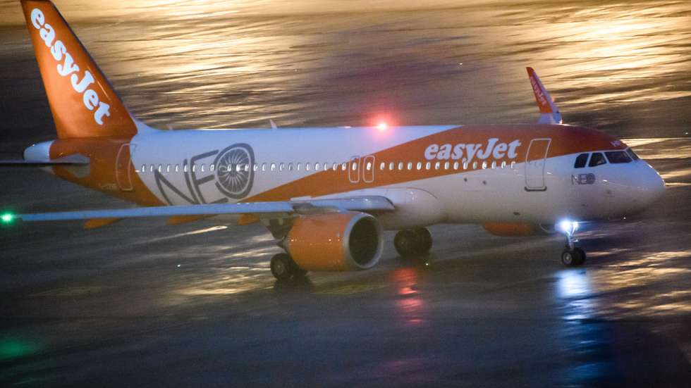 epa08790250 An EasyJet plane, starting as the first commercial flight since the airport’s opening, drives on the apron towards the tarmac, a day after the official opening of BER Berlin Brandenburg Airport in Schoenefeld, Germany, 01 November 2020. The BER airport was opened on 31 October 2020 nearly nine years after it was supposed to open in the year 2011. A series of technical issues and general mismanagement led to a six-time postponement of the opening. On 31 October 2020 two planes landed during the opening ceremony, 24 years after the construction decision of the airport was made.  EPA/CLEMENS BILAN