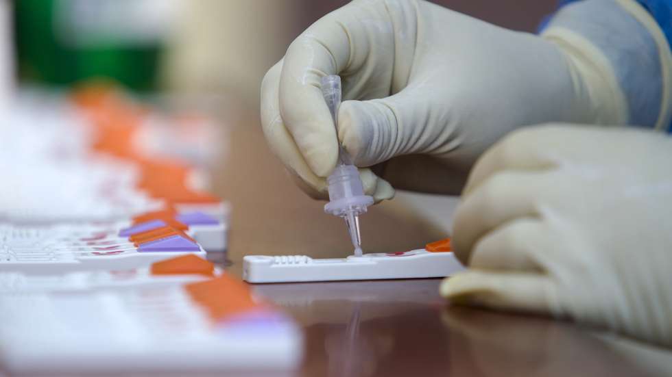 epa08856587 A Ministry of Health staff collects a swab sample for an antigen test amid the ongoing coronavirus COVID-19 pandemic at Kathmandu, Nepal, 02 December 2020. According to local media the test is newly launched at the government level to detect COVID-19 infection in the community. Results will be available within 30 minutes which makes this test much more easier.  EPA/HEMANTA SHRESTHA