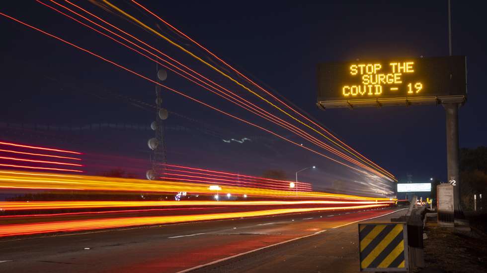 epaselect epa08844346 A highway sign along state HWY 99 in California's Central Valley, encourages people to help stop the novel coronavirus in Merced, California, USA, 26 November 2020. Despite warnings of health officials to stay home due to the increases of Covid-19 cases through out the states, some people are still traveling for the Thanksgiving holiday.  EPA/PETER DASILVA