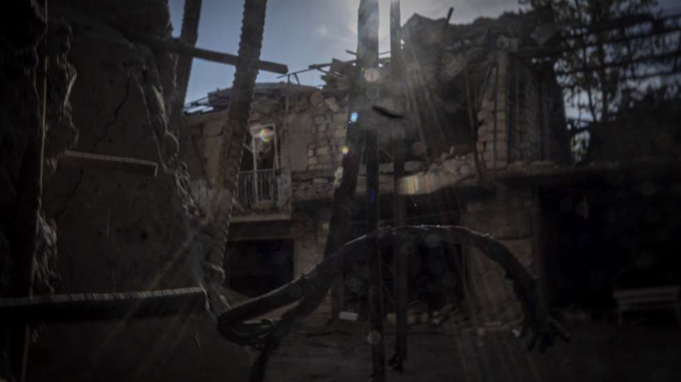 epa08870401 (02/13) The damaged frame of a house shows the effects of days of shelling in Nagorno Karabakh, in Stepanakert, 31 October 2020. Although only some isolated areas in Stepanakert were directly targeted by the Azerbaijani forces, the effects of the battle were easy to spot. According to the Nagorno Karabakh Human Rights Ombudsman, some 14,000 homes and civilian properties were damaged in the conflict.  EPA/RICARDO GARCIA VILANOVA  ATTENTION: For the full PHOTO ESSAY text please see Advisory Notice epa08870399