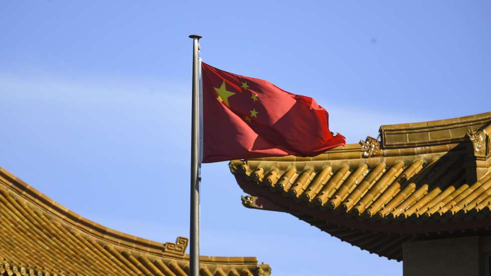 epa08852336 A Chinese national flag flies at the Chinese Embassy in in Canberra, Australia, 30 November 2020. On 30 November, Australian Prime Minister Scott Morrison call for China to apologise for a social media post depicted an Australian soldier murdering an Afghan child. According to the Australian government, China's Foreign Ministry spokesman Lijian Zhao posted the image.  EPA/LUKAS COCH AUSTRALIA AND NEW ZEALAND OUT