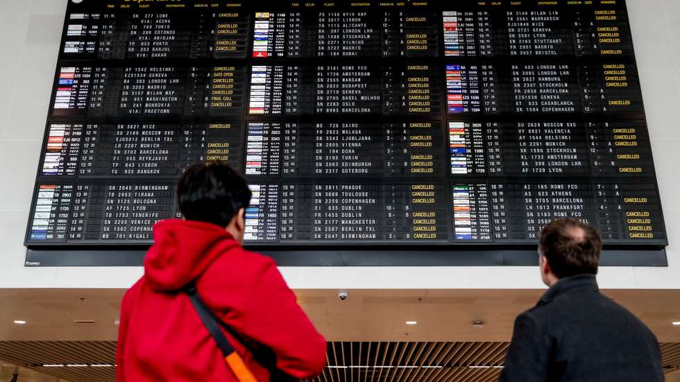 epa08308823 A view of the departure boarding where most of the flights are cancelled at Zaventem International Airport near Brussels, Belgium, 20 March 2020. Brussels Airlines has decided to temporarily suspend its flight operations from 21 March 2020. In order to contain the spread of coronavirus, Belgium is implementing confinement guidelines for the public which is scheduled to be in place until 05 April 2020. Only supermarkets and essential trade will remain open.  EPA/STEPHANIE LECOCQ