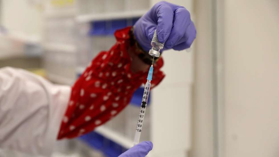 epa08895089 A senior nurse prepares a shot of the Pfizer-BioNTech COVID-19 vaccine at Shaare Zedek Medical Center in Jerusalem, Israel, 20 December 2020. Israel begins a nationwide COVID-19 vaccination campaign as hundreds of thousands of vaccines are delivered to hospitals across the country. First, the medical staff will be vaccinated and then people from high potential risk groups and the elderly population. Authorities hope to vaccinate as many people as possible.  EPA/ABIR SULTAN