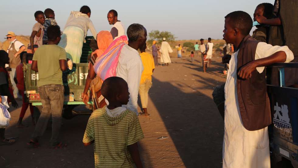 epa08827821 A handout photo made available by the UN World Food Programme (WFP) shows Ethiopian refugees who fled the conflict in Ethiopia's Tigray region at the Hamdayet Reception Center, in the border town of Hamdayet, Sudan, 17 November 2020 (issued 18 November 2020). Tens of thousands of refugees are crossing the border from Ethiopia to Sudan, fleeing conflict in Ethiopia’s Tigray region. WFP has been on ground providing emergency food and logistics support.  EPA/LENI KINZLI / HANDOUT  HANDOUT EDITORIAL USE ONLY/NO SALES