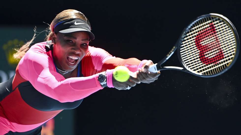 epa09000029 Serena Williams of the United States of America in action against Nina Stojanovic of Serbia during their second round match of the Australian Open Grand Slam tennis tournament in Melbourne, Australia, 10 February 2021.  EPA/DAVE HUNT  AUSTRALIA AND NEW ZEALAND OUT
