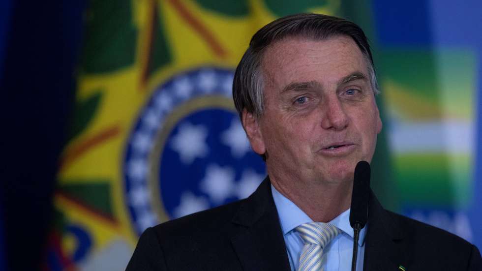 epa09034882 The President of Brazil Jair Bolsonaro during the ceremony of approval of the Central Bank Autonomy Law, in Brasilia, Brazil, 24 February 2021. Brazilian President Jair Bolsonaro renewed his Government with changes in two ministries and sanctioned a law that gives autonomy to the Central Bank, which is part of his objective of liberalizing the country's economy.  EPA/Joedson Alves