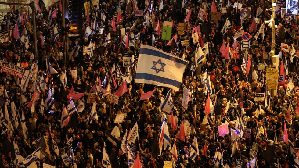 epa09086695 Anti-Netanyahu protesters take part in a rally outside the Israeli Prime Minister's residence, in Jerusalem, Israel. 20 March 2021. Prime Minister Benjamin Netanyahu pleaded not guilty on 08 February 2021 at the resumption of his ongoing trial with indictments filed against him by the State Attorney's Office on charges of fraud, bribery, and breach of trust. The country is set to hold general elections for the 24th Knesset on 23 March 2021.  EPA/ABIR SULTAN