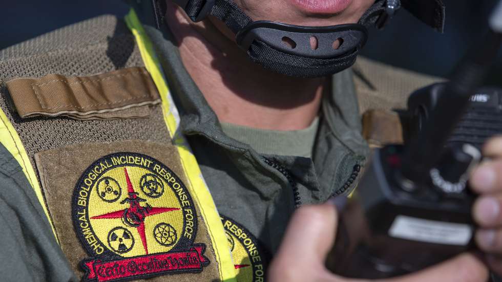 epa07817224 A US Marine assigned to the Chemical Biological Incident Response Force works during the Capital Shield 2019 joint training exercise at Fort Lesley J. McNair in Washington, DC, USA, 04 September 2019. The disaster exercise, focusing on urban search and rescue and mass casualty scenarios, simulated an explosion at the L'Enfant Plaza Metro station.  EPA/ERIK S. LESSER