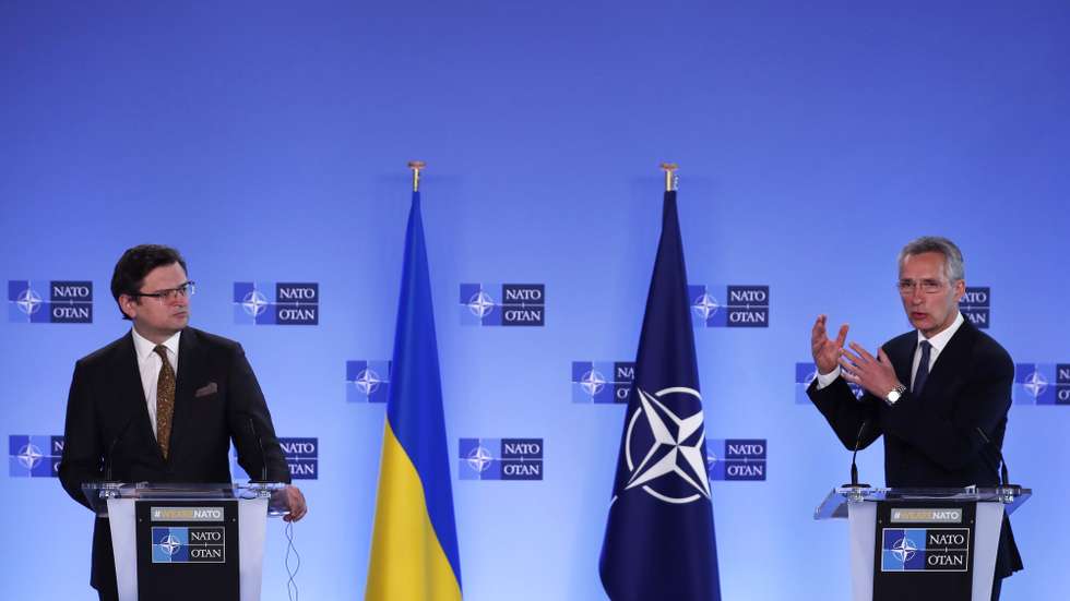 epa09132268 NATO Secretary General Jens Stoltenberg, right, and Ukraine's Foreign Minister Dmytro Kuleba participate in a media conference at NATO headquarters in Brussels, Belgium, 13 April 2021. NATO Secretary General Jens Stoltenberg and Ukrainian Foreign Minister Dmytro Kuleba met 13 April to discuss Russia’s troop buildup troops along the frontier with Ukraine.  EPA/Francisco Seco / POOL