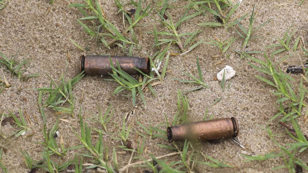 epa09131133 Spent AK rifle capsules in the street of Palma, Cabo Delgado, Mozambique, 12 April 2021. The violence unleashed more than three years ago in Cabo Delgado province escalated again about two weeks ago, when armed groups first attacked the town of Palma.  EPA/JOAO RELVAS