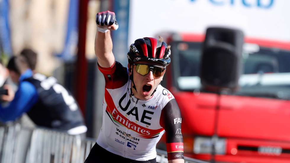 epa09120658 Slovenian rider Tadej Pogacar of UAE Emirates team wins the third stage of the 60th Itzulia Basque Country cycling tour over 167.7 km between Amurrio and Ermualde, Basque Country, Spain, 07 April 2021.  EPA/DAVID AGUILAR