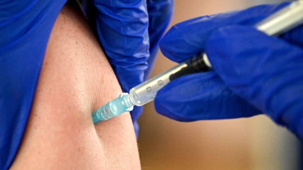 epa09184811 A person receives a shot of COVID-19 vaccine at the Cologne Central Mosque in Cologne, Germany, 08 May 2021. Citizens of Cologne can receive a shot of AstraZeneca vaccine within the mosque premises without previous registration.  EPA/SASCHA STEINBACH