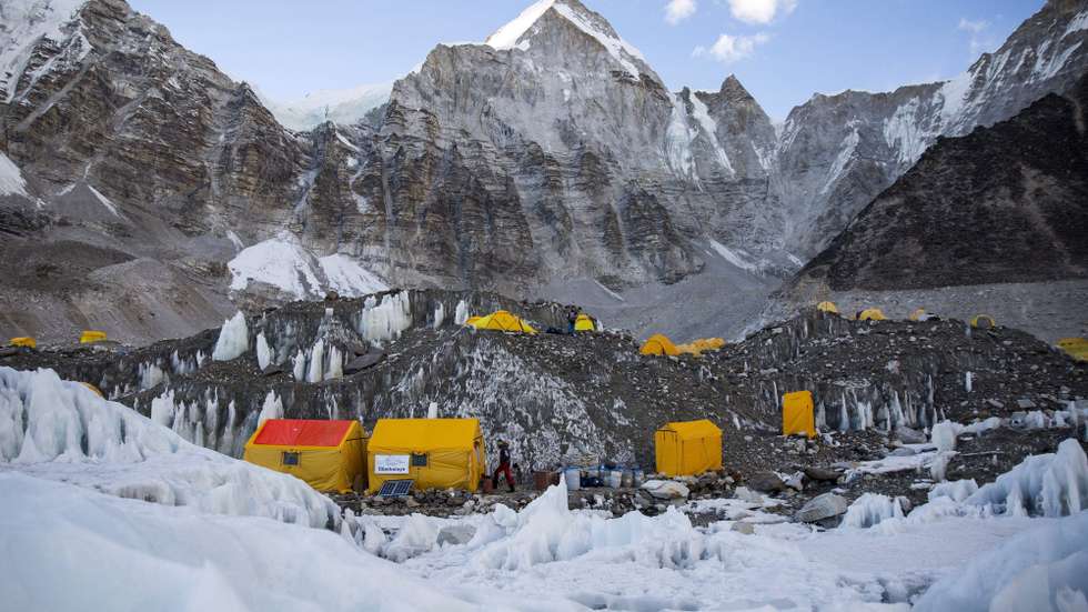 epa08869820 (FILE) - Tents stand in the Everest Base Camp of the mountaineers in Nepal, 07 April 2017 (reissued 08 December 2020). Nepal and China have agreed on a new official height for Mount Everest. The height of the world's highest peak is now given as 8,848.86 meters. In the past two years, China and Nepal have sent teams to take measurements at the summit in the border area.  EPA/Balazs Mohai HUNGARY OUT *** Local Caption *** 53553598