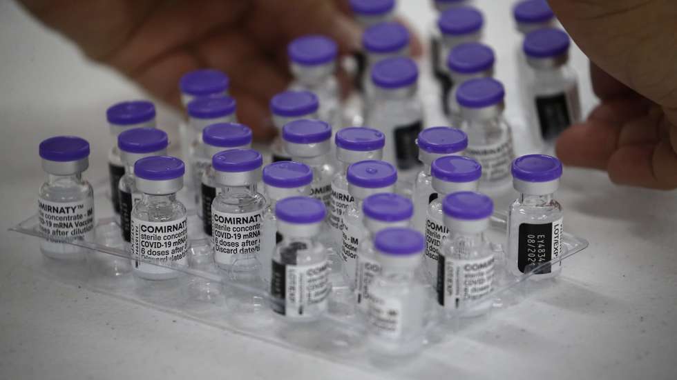 epa09214217 Vials of Pfizer COVID-19 vaccine are prepared for an inoculation drive in Marikina City, Metro Manila, Philippines, 20 May 2021. The Department of Health is working with local government units to suspend early announcements of vaccine brands available for scheduled vaccination dates and instead inform citizens right before inoculation in order to get consent. The move is aimed at encouraging equal confidence in all available vaccines and avoid overcrowding in inoculation centers caused by brand preference.  EPA/ROLEX DELA PENA
