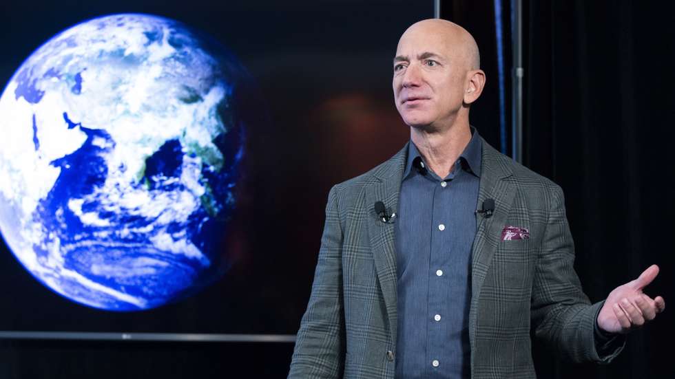 epa09252852 (FILE) - Founder and CEO of Amazon Jeff Bezos participates in the unveiling of an Amazon environmental initiative entitled 'The Climate Pledge', in Washington, DC, USA, 19 September 2019 (reissued 07 June 2021). Outgoing Amazon CEO Jeff Bezos via social media on 07 June 2021 announced he and his brother will be on Bezos's space company Blue Origin's first crewed space flight. The lflight is scheduled for 20 July 2021.  EPA/MICHAEL REYNOLDS *** Local Caption *** 56666667