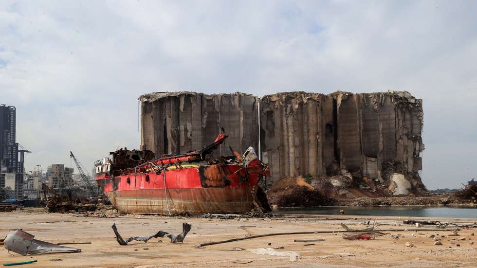 epa08986602 The damaged grain silos at the destroyed port area at the six months mark since the day of the explosion, in Beirut, Lebanon, 04 February 2021. At least 200 people were killed, and more than six thousand injured in the Beirut blast that devastated the port area on 04 August 2020. It is believed to have been caused by an estimated 2,750 tons of ammonium nitrate stored in a warehouse.  EPA/NABIL MOUNZER