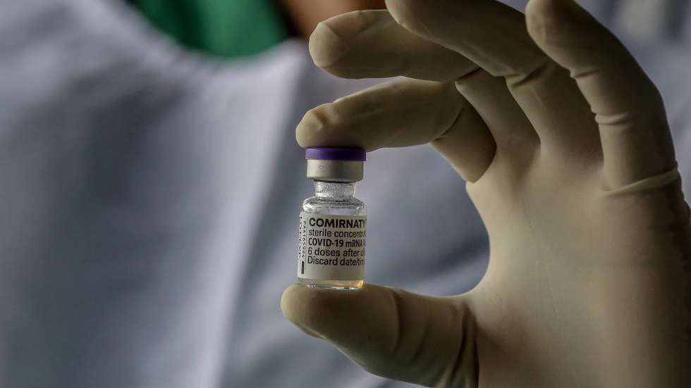 epa09328159 A health worker holds a vial of the Pfizer- BioNTech Comirnaty Covid-19 vaccine at a vaccine center in Colombo, Sri Lanka, 07 July 2021. Following approval by the World Health Organisation for Pfizer- BioNTech and Moderna vaccines to be administered as the second dose for those who have received Astra-Zeneca as the first dose, Sri Lanka is the third South Asian country to receive and begin the vaccination process. The Maldives and Bangladesh are the first and second countries respectively to receive this vaccine through the WHOâ€™s COVAX facility, according to the UNICEF. Sri Lanka is currently using Oxford AstraZeneca, China's Sinopharm, Russian Sputnik V, Covid -19 vaccines for the Vaccine rollout. Meanwhile, Sri Lanka is currently experiencing a serious shortage of Oxford AstraZeneca (Covishield) vaccine, to be given as a second dose.  EPA/CHAMILA KARUNARATHNE