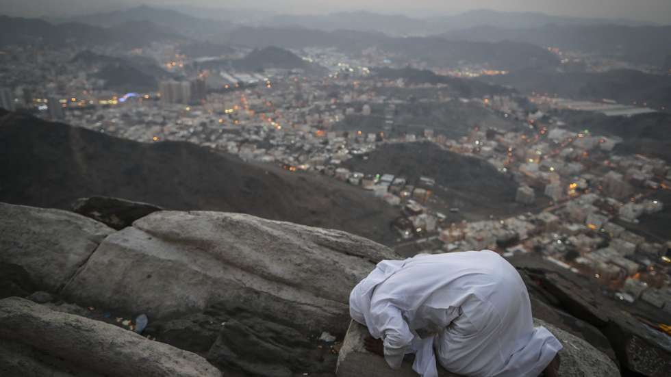 epaselect epa06169111 A Muslim worshipper prays on the top of Mount Al-Noor where the Prophet Muhammad received the first words of the Koran in Mecca, Saudi Arabia, 28 August 2017. Around 2.6 million muslims are expected to attend this year's Hajj pilgrimage, which is highlighted by the Day of Arafah, one day prior to Eid al-Adha. Eid al-Adha is the holiest of the two Muslims holidays celebrated each year, it marks the yearly Muslim pilgrimage (Hajj) to visit Mecca, the holiest place in Islam. Muslims slaughter a sacrificial animal and split the meat into three parts, one for the family, one for friends and relatives, and one for the poor and needy.  EPA/MAST IRHAM
