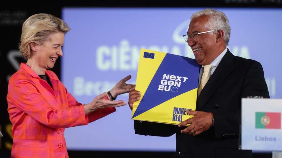 The President of the European Commission, Ursula von der Leyen (L) gives the 'Next Generation EU recovery program of the European Union' to Portuguese Prime Minister Antonio Costa (R), after their meeting on the Pavilion of Knowledge in Lisbon, Portugal, 16 June 2021
