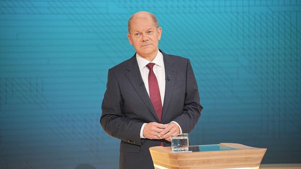 epa09464152 German Minister of Finance and Social Democratic Party (SPD) top candidate for the federal elections Olaf Scholz pictured in the studio during the ARD/ZDF TV station live recording of the TV debate 'The Truel. Three-way fight for the chancellorship' ('Das Triell. Dreikampf ums Kanzleramt') in Berlin, Germany, 12 September 2021. For the second time prior to the general elections on 26 September 2021, the three candidates of Greens, Christian Democrats and Social Democrats, meet in a 'truel', for a live TV debate in the evening of 12 September 2021.  EPA/Michael Kappeler / POOL