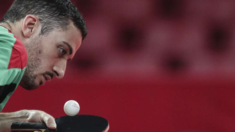 O jogador português, Marcos Freitas, em ação durante o torneio por equipas de ténis de mesa disputado no Ginásio Metropolitano em Tóquio, 01 de agosto de 2021. TIAGO PETINGA/LUSA