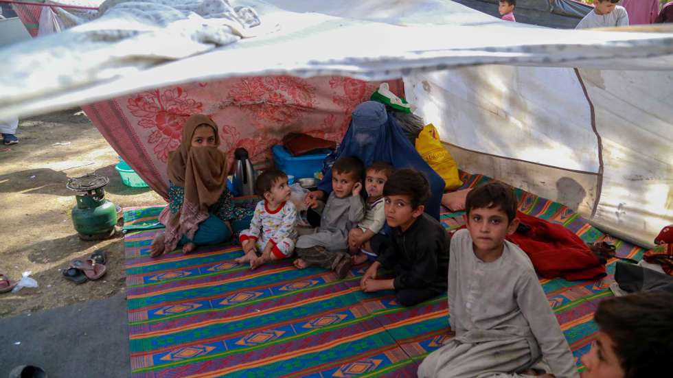 epa09514972 Afghan children who were displaced from other parts of the country live in temporary shelters at a camp in Kabul, Afghanistan, 09 October 2021. Some 3.2 million children under the age of five are at risk of severe malnutrition in Afghanistan by the end of the year as a result of the country&#039;s severe humanitarian crisis, augmented by the Taliban&#039;s takeover of the country, according to the Unicef  EPA/STRINGER