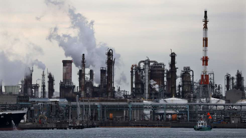 epa09152055 (FILE) - Chimneys are seen at a plant in Kawasaki, south of Tokyo, Japan, 13 December 2018 (reissued 22 April 2021). On 22 April 2021, Japanese Prime Minister Yoshihide Suga said the country will aim to cut greenhouse gas emission by 46 per cent by 2030.  EPA/KIMIMASA MAYAMA