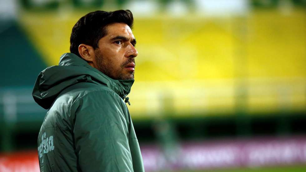 epa09178188 Palmeiras' coach Abel Ferreira watches the Copa Libertadores Group A soccer match between Defensa y Justicia and Palmeiras at the Norberto Tomaghello stadium in Buenos Aires, Argentina, 04 May 2021.  EPA/Marcos Brindici/POOL