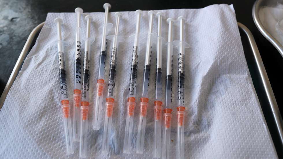 epa09461187 Syringes with a dose of the Moderna COVID-19 vaccine during the national intensive vaccination days against Covid-19, at a school in Tunis, Tunisia, 11 September 2021. The aim is to accelerate Covid-19 vaccination amid outbreak of the coronavirus in the country. Tunisia received on 10 September an American donation of 500,000 doses of anti-Covid vaccines. Several countries have mobilized since July their medical support to Tunisia by offering medical equipment, oxygen and thousands of doses of vaccines.  EPA/MOHAMED MESSARA