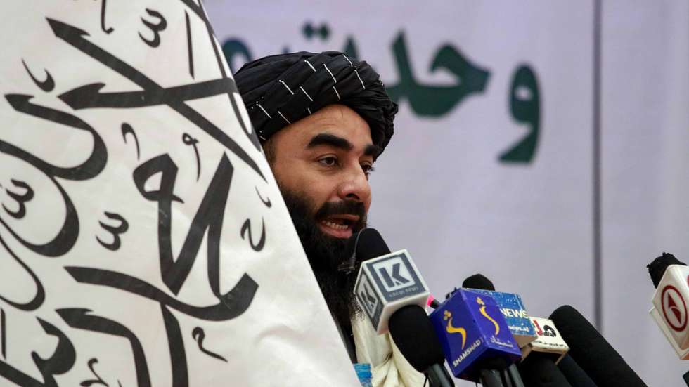 epa09602612 Taliban's spokesman Zabiullah Mujahid talks with audience during a ceremony in which Shi'ite Muslims and their elders gathered to promote inter-faith harmony, in Kabul, Afghanistan, 25 November 2021. According to a press release issued by the Taliban, the participants of the meeting expressed their support for the Taliban government, and stressed on the unity among the nations and religions in the country. Despite facing strong opposition, the IS militants who have been actively targeting the Shi'ite Muslims and Taliban, has a strong presence in the capital and remote areas of Nangarhar and has now emerged as a major threat to the Taliban, being able to carry out attacks such as the one at Kabul airport on August 26 leaving at least 170 dead.  EPA/STRINGER