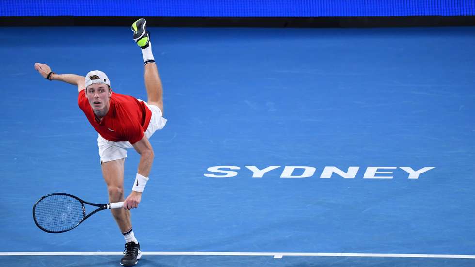 epa09674743 Denis Shapovalov of Canada in action during the ATP Cup Final against Pablo Carreno Busta of Spain on Day 9 of the ATP Cup tennis tournament at Ken Rosewall Arena in Sydney, Australia, 09 January 2022.  EPA/DEAN LEWINS EDITORIAL USE ONLY AUSTRALIA AND NEW ZEALAND OUT