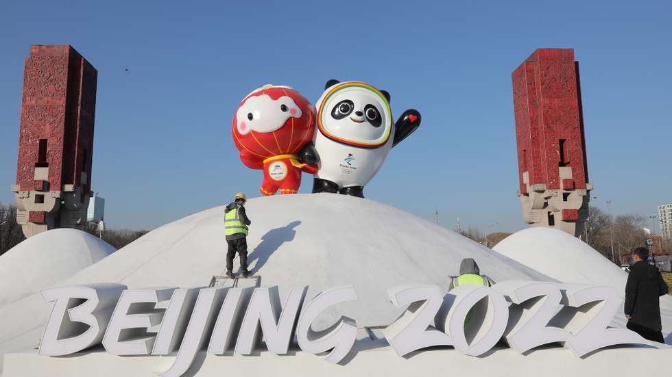 epaselect epa09678214 Chinese workers spray paint near the Bing Dwen Dwen, the Beijing 2022 Winter Olympic Mascot and Shuey Rhon Rhon, the 2022 Beijing Winter Paralympic Games Mascot, in Beijing, China, 11 January 2022. China is scheduled to host the Beijing 2022 Olympic and Paralympic Winter Games in February, making its capital the first city in the world to host both Summer (2008) and Winter Olympics (2022).  EPA/WU HONG